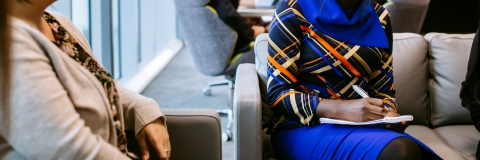 Smiling student in library in placements meeting