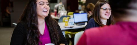 Students studying in group in library