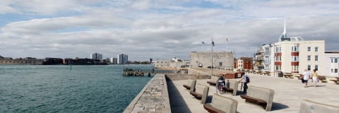 Sea view of Old Portsmouth, with outside stone benches