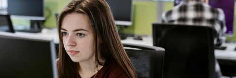 Female student using computer