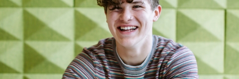Male student smiling