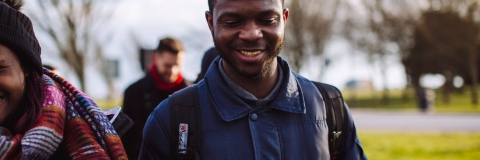 International students walking across The Common in Southsea