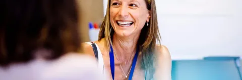 Smiling member of staff