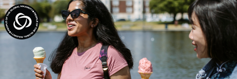 People of the Global Majority hero image showing a student outside eating an ice cream