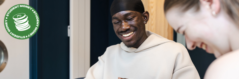 Student Money hero image showing two students playing a board game