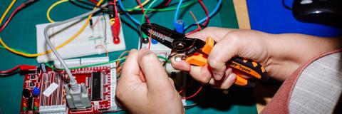 Student using equipment in engineering lab