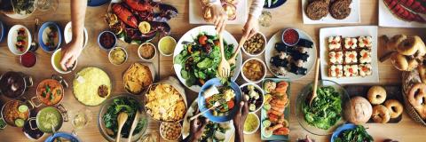 Busy meal at table from top-down