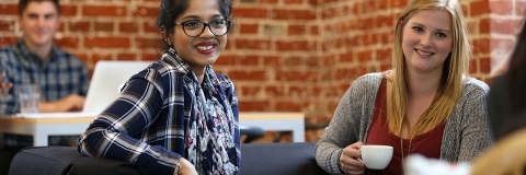 students talking in learning space