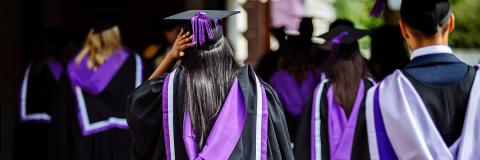 group of students in graduation gowns