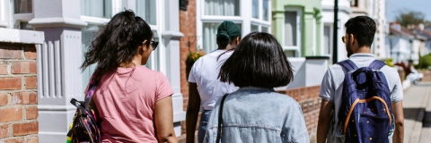 Group of three students walking down Portsmouth road