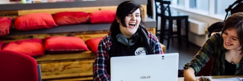 Students laughing and studying in Eldon cafe