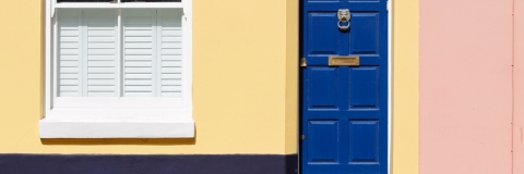 Colourful house with blue front door