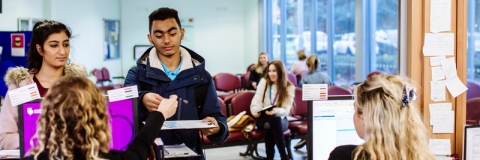Students signing up at the Dental Academy
