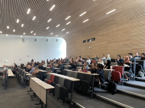 A packed lecture theatre of students attending the Festival