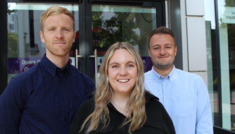 The University's Graduate Recruitment Consultants - Rich, Lorna and James - standing in front of the Careers Centre
