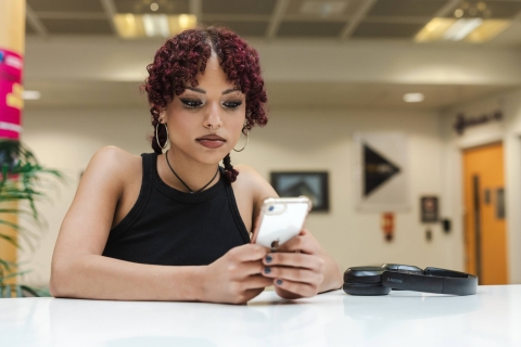 Student looking at phone
