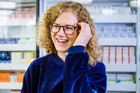 A student in a pharmacy
