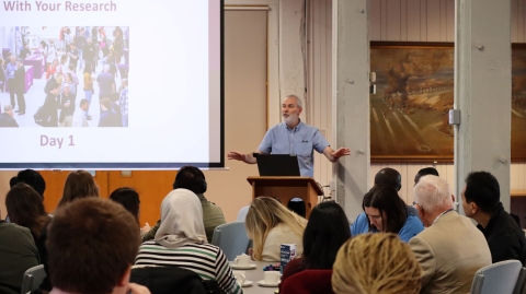 Dr Vincent Adams welcoming the postgraduate research students