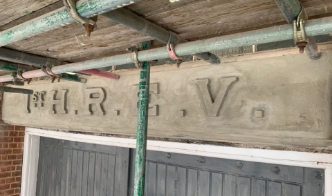 Restored lintel with lettering 1st H.R.E.V