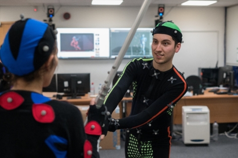 Students in motion capture suits engage incombat