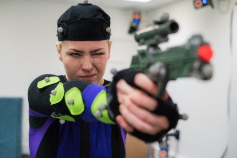 Student fires gun in motion capture suit