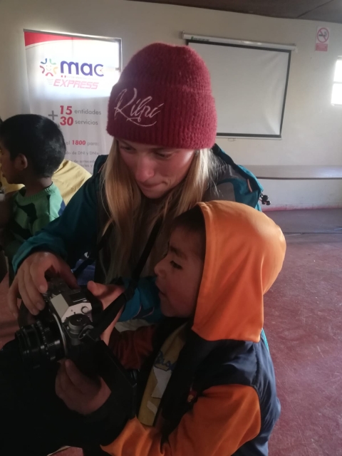 Eliska showing her camera equipment