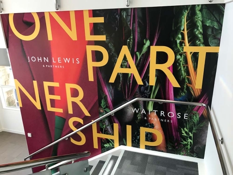 One Partnership with John Lewis - sign on the office stairs