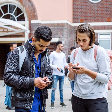 students-looking-at-mobiles