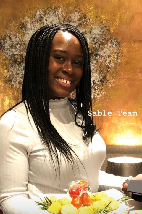 Vanelle Richards helping at the Sable Christmas Party