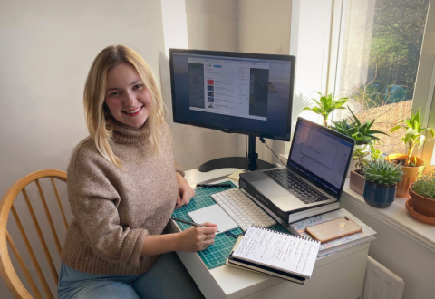 Vanessa sitting at desk