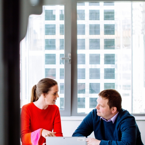 Staff members in a meeting