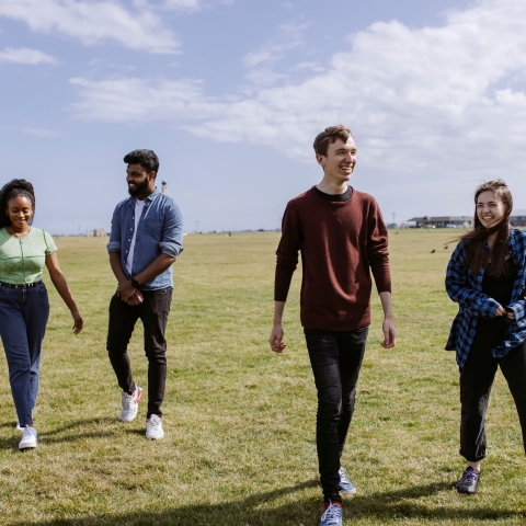 A group of sudents hanging out on the common