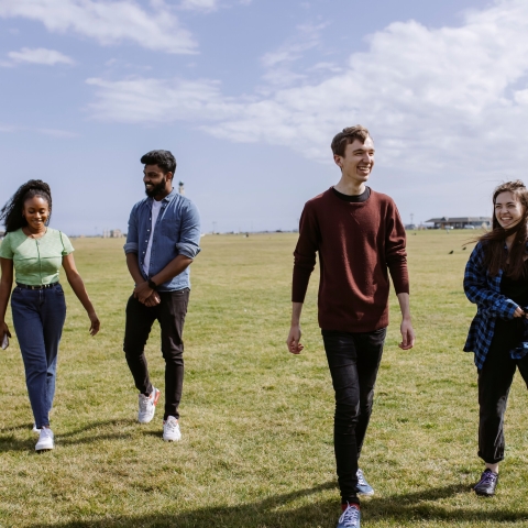 A group of sudents hanging out on the common