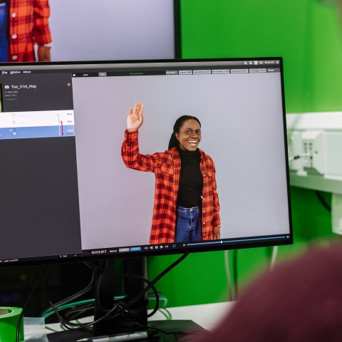 Student editing the footage recorded in the Green Screen Digital Studio in the Eldon Building
