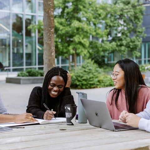 Four University of Portsmouth students talking