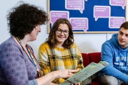 University Student Finance staff advising a student
