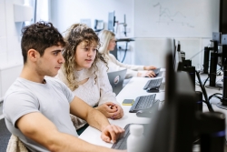 Students working together at a computer