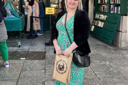 Photo of Sarah Groszewski standing outside a bookshop