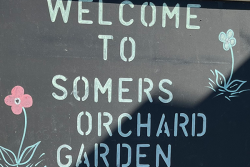 Sign that says Welcome to Somers Orchard Garden