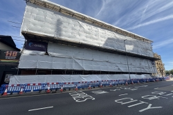 Building surrounded by scaffolding