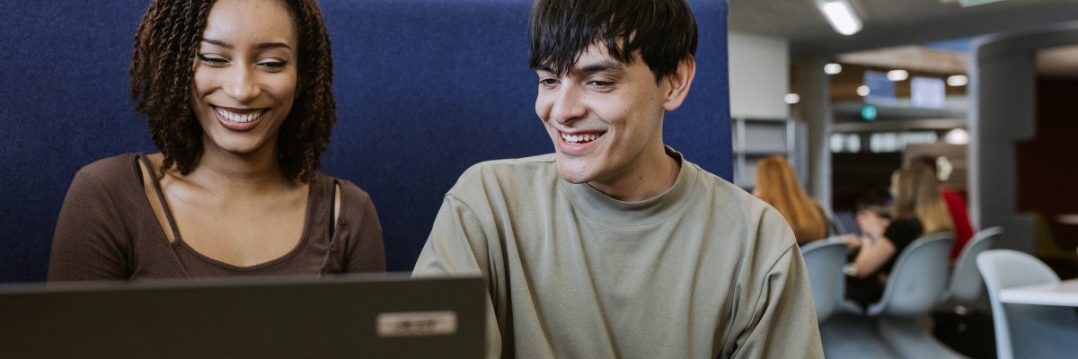 Students working on a laptop