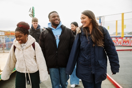 Students walking past Clarence Pier