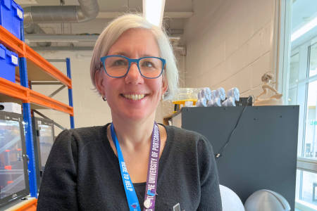  Associate Head (Students), Portsmouth School of Architecture, Art & Design holding the Student Impact Award prototype