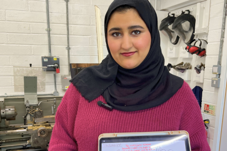 Ranad Almajed, BA (Hons) Architecture holding SIA sketch and prototype