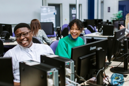 Accounting students enjoying studying in suite