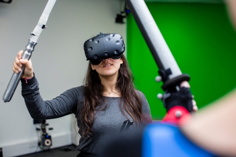 Female student participates in the motion capture studio