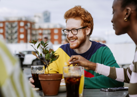Students sitting together having a drink