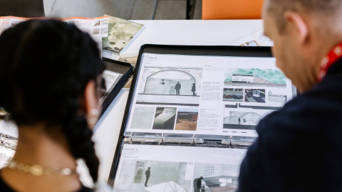 A student getting feedback on their portfolio