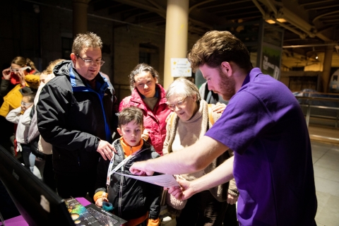 Family wearing glasses at Thermal Imagery camera stall.